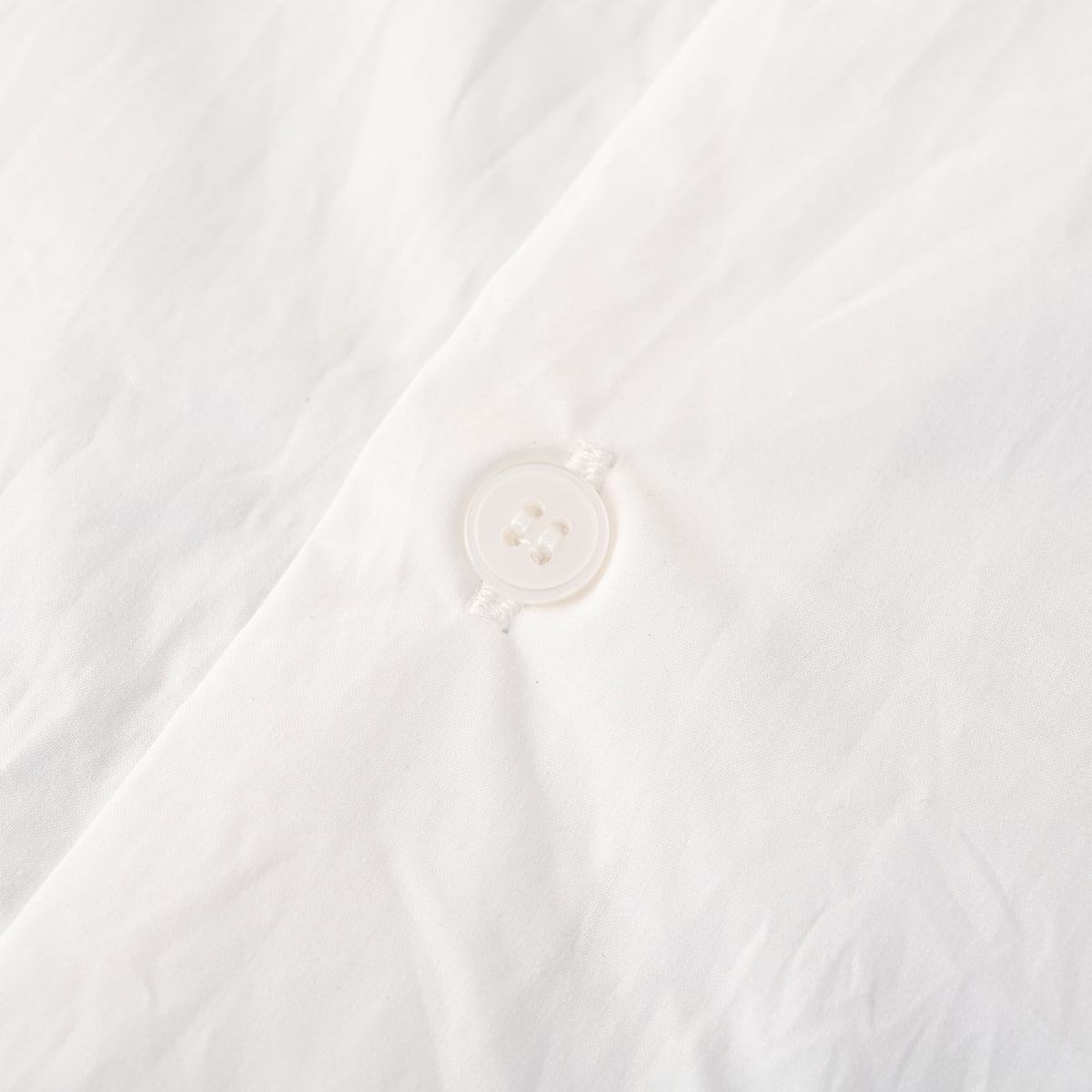 Louis Vuitton White Long-Sleeve Button-Up Shirt with Black Letter Embroidery, Drop-Shoulder Silhouette, Shell Buttons and Curved High-Low Hem