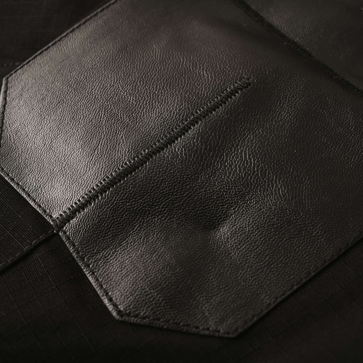 Louis Vuitton Metal Logo Workwear Jacket with Leather Sleeve Panels | Luxury Designer Utility-Inspired Streetwear