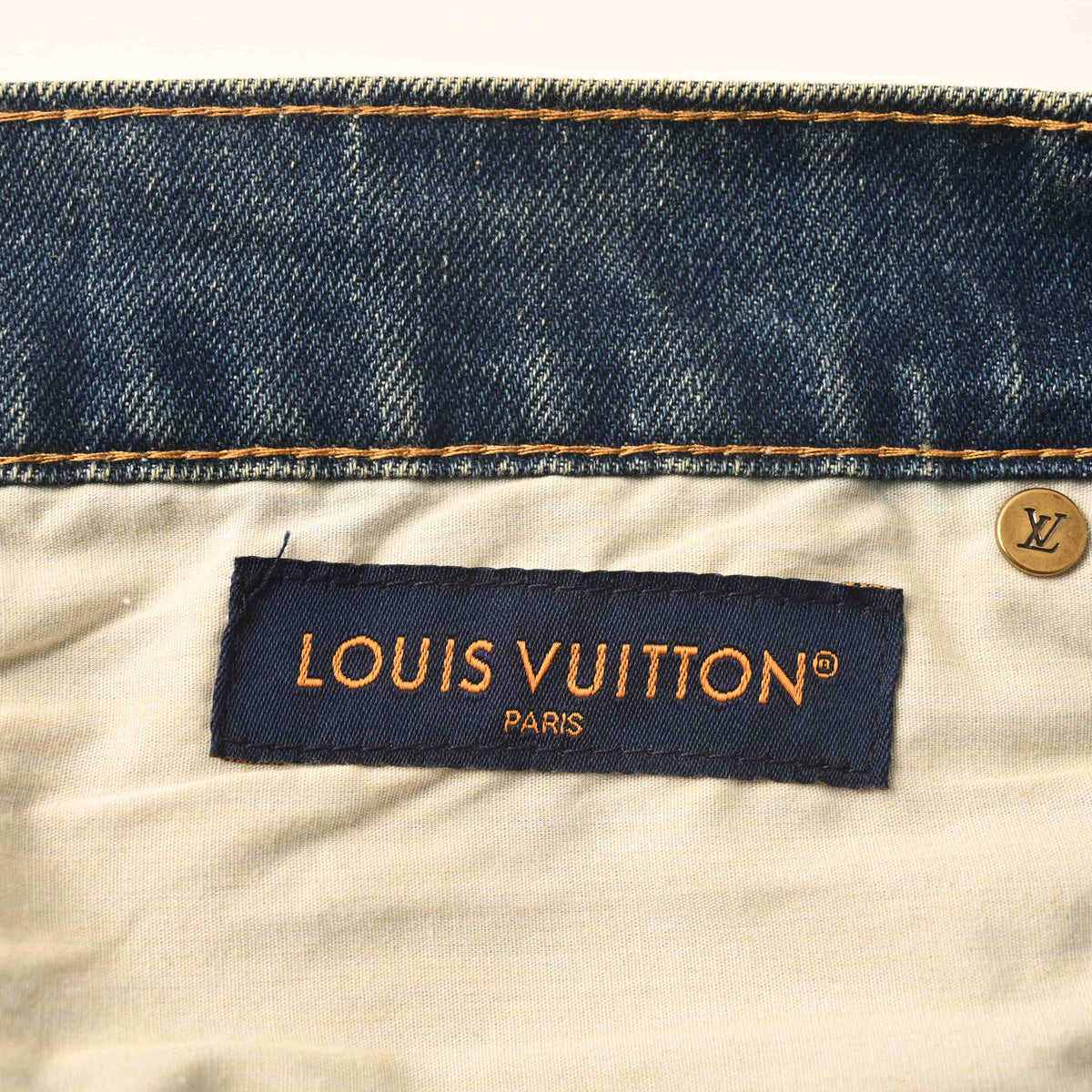 Louis Vuitton Washed Blue Straight-Leg Jeans with Brown Leather Back Pockets, Vintage-Inspired Designer Denim