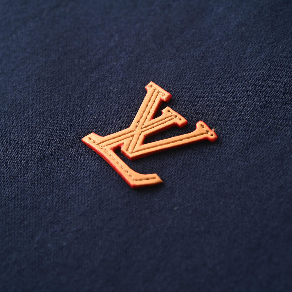 Louis Vuitton Leather Logo Patch Crewneck Sweatshirt | Designer Casual Pullover for Understated Streetwear