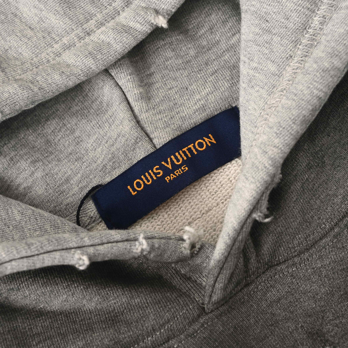 Louis Vuitton Washed Grey Floral Embroidered Hoodie, Heavyweight Cotton Pullover with Distressed Holes, Script Back Lettering and Kangaroo Pocket