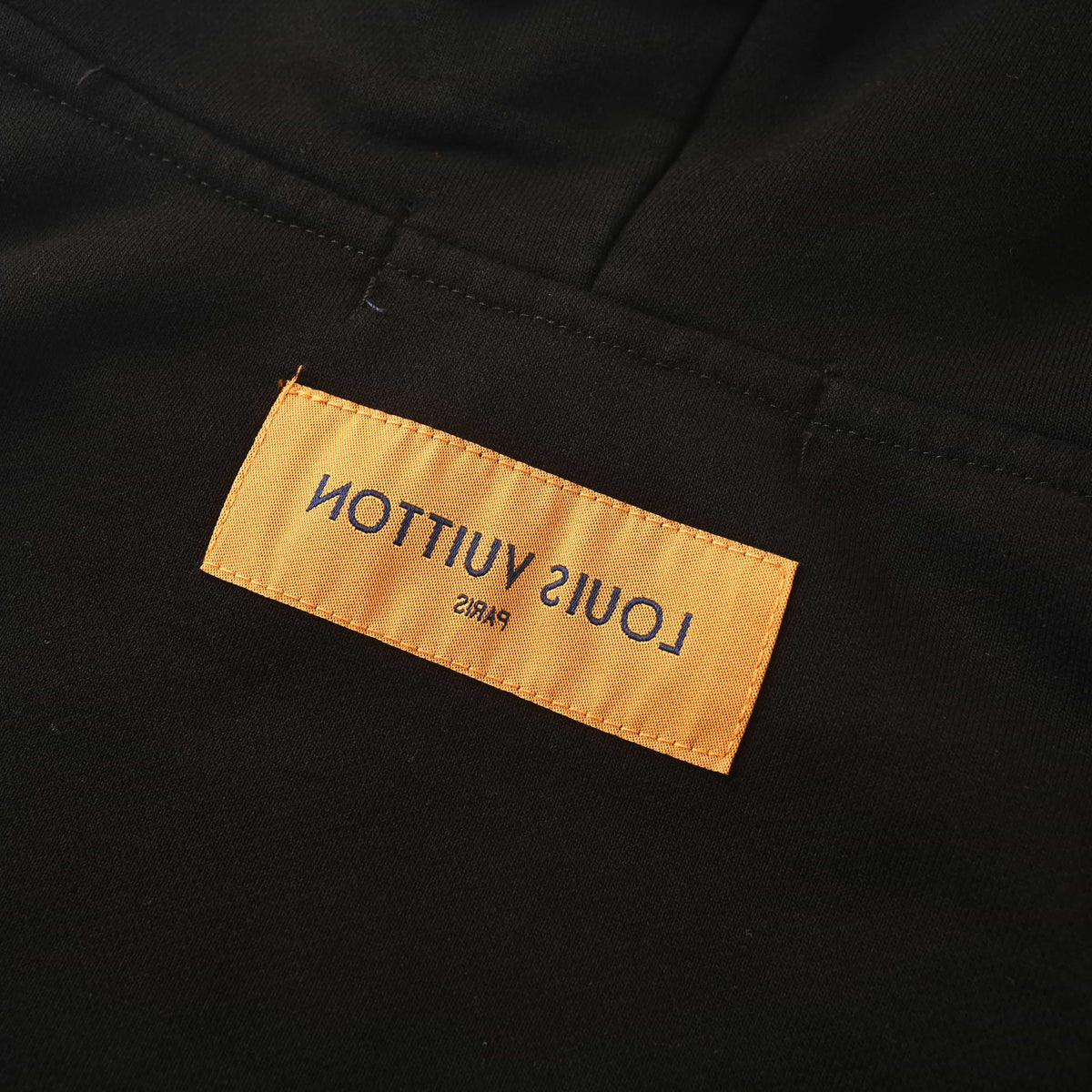Louis Vuitton Black Tonal Monogram Pullover Hoodie with Wave Chest Panel, Embroidered Logo Detailing and Ribbed Trim for Minimalist Streetwear