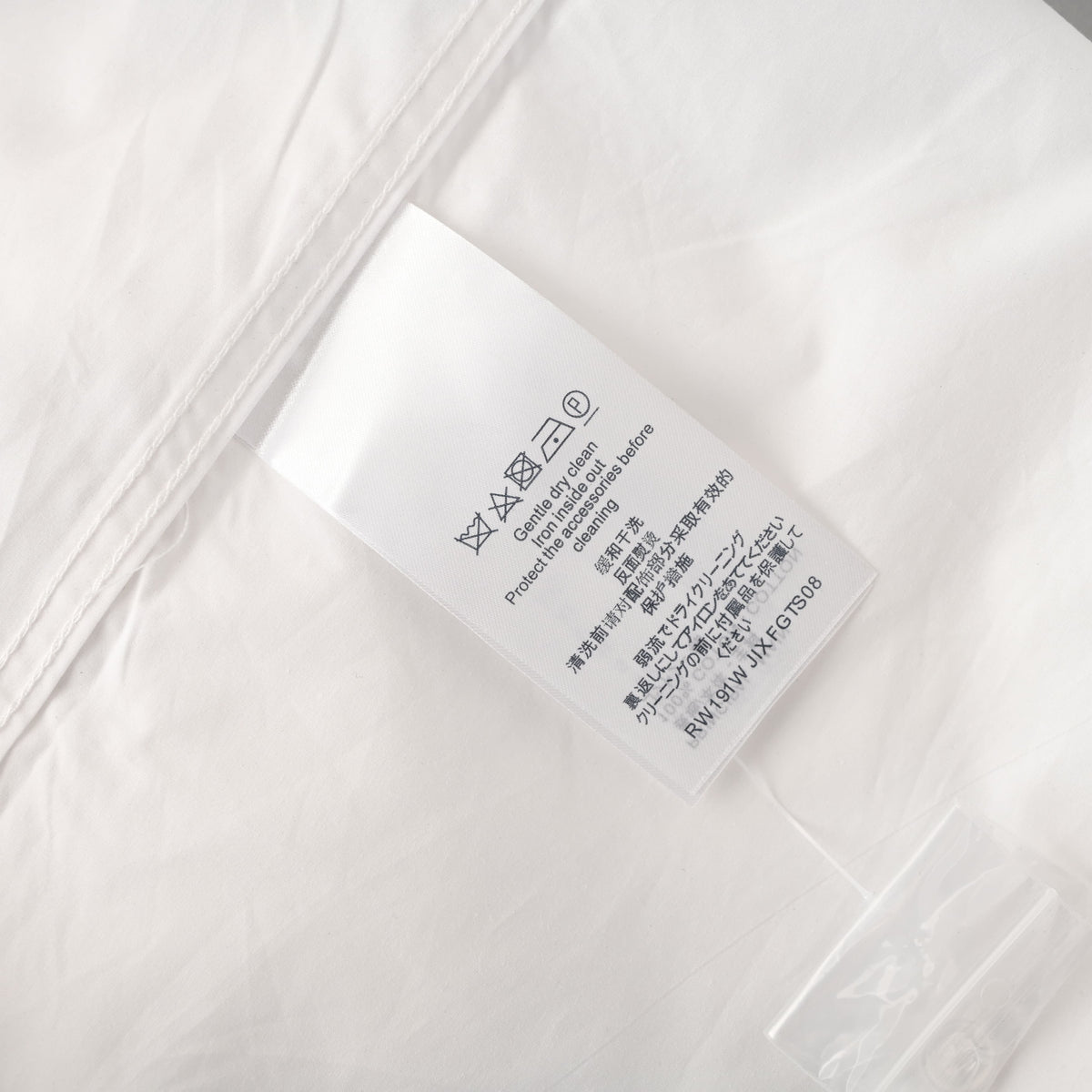 Louis Vuitton White Long-Sleeve Button-Up Shirt with Black Letter Embroidery, Drop-Shoulder Silhouette, Shell Buttons and Curved High-Low Hem
