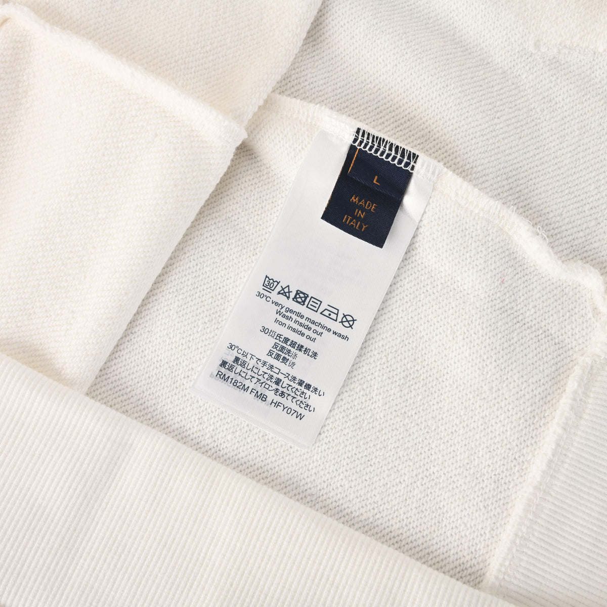 Louis Vuitton Ivory Cotton French Terry Hoodie with Tan Leather Chest Patch, Unisex Relaxed-Fit Pullover with Drawstring Hood and Kangaroo Pocket