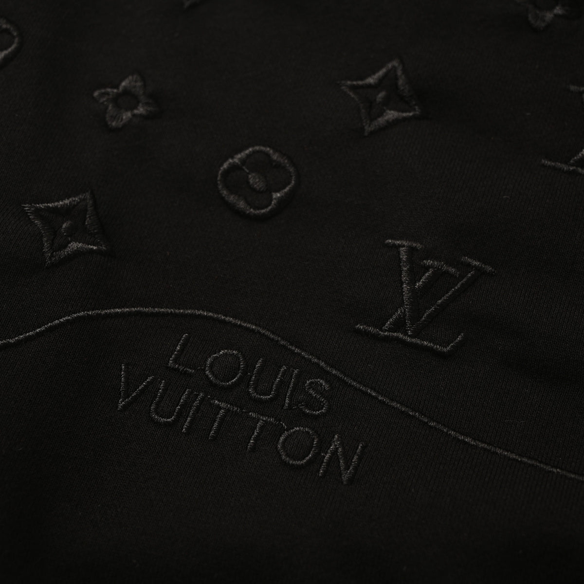 Louis Vuitton Black Tonal Monogram Pullover Hoodie with Wave Chest Panel, Embroidered Logo Detailing and Ribbed Trim for Minimalist Streetwear