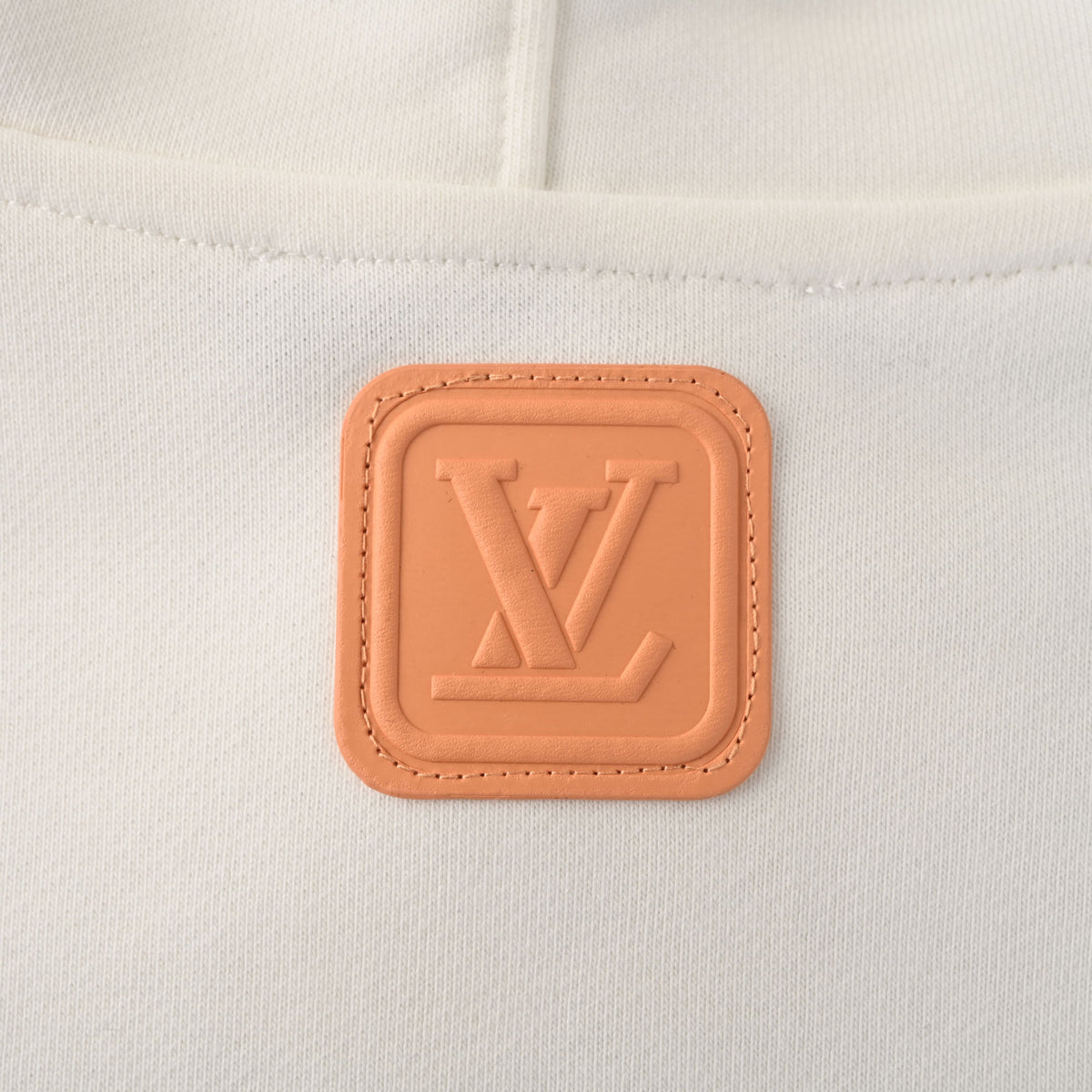 Louis Vuitton Ivory Cotton French Terry Hoodie with Tan Leather Chest Patch, Unisex Relaxed-Fit Pullover with Drawstring Hood and Kangaroo Pocket